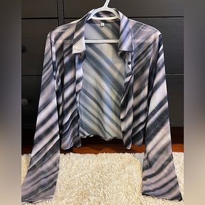 This lovely mesh long sleeve top is the perfect top to go out with!